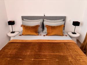 Ένα ή περισσότερα κρεβάτια σε δωμάτιο στο Studio Miravelle