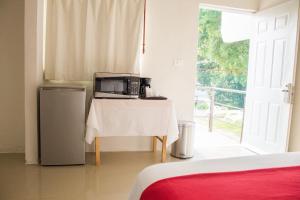 Η κουζίνα ή μικρή κουζίνα στο Rosvel Hotel