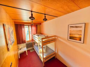 Кровать или кровати в номере Vintage Tirol Apartment