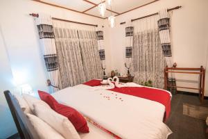 Кровать или кровати в номере Top View Cottage