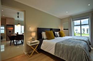 Giường trong phòng chung tại Montblanc Cottage