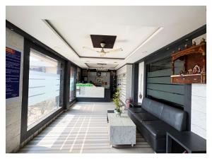 a corridor of a restaurant with a ceiling at BIG বিগ বস Boss Front The New Digha Sea Beach in Digha