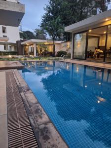 Πισίνα στο ή κοντά στο UN approved Cosy home with pool