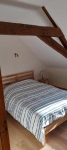 Postel nebo postele na pokoji v ubytování Gîte la Petite Gilardière