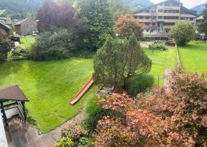 an aerial view of a yard with a playground at Mellau Appartments 220 in Mellau +8 photos