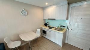 Kuchyň nebo kuchyňský kout v ubytování Seven Seas Resort - Jomtien Beach