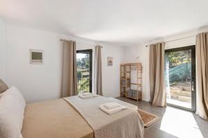 Postel nebo postele na pokoji v ubytování Casa Do Alago + 21 fotografií