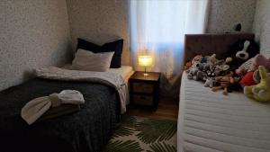 Ένα ή περισσότερα κρεβάτια σε δωμάτιο στο Apartment in peacefull surroundings