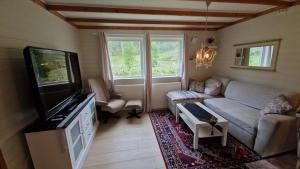 Μια τηλεόραση ή/και κέντρο ψυχαγωγίας στο Apartment in peacefull surroundings