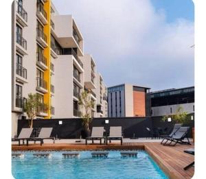 Πισίνα στο ή κοντά στο Sleek and modern apartment