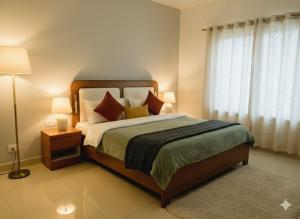 Postel nebo postele na pokoji v ubytování Hotel Jayaditya Palace Near Ram Mandir