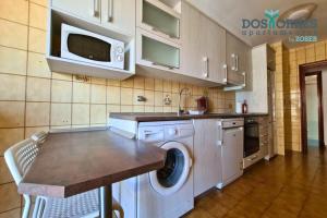 Kuchyň nebo kuchyňský kout v ubytování Dos Torres Tauriel - Espacioso apartamento con impresionantes vistas y garaje privado