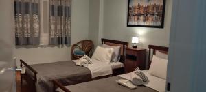 Ένα ή περισσότερα κρεβάτια σε δωμάτιο στο Alexandra's house