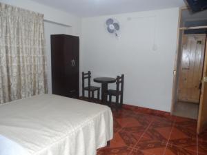 Letto o letti in una camera di Antares Inn