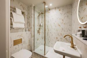 a bathroom with a shower and a sink and a toilet at Francis Hotel Bath in Bath +64 photos