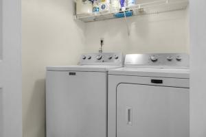 Kuchyň nebo kuchyňský kout v ubytování Leaning Palms + 48 fotografií