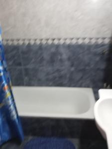 a blue bottle sitting on top of a table at La Cautiva 