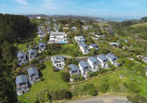 an aerial view of a large estate with houses at Palm Waiheke Island Resort in Palm Beach