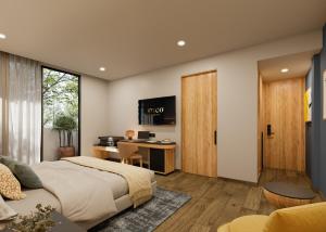 a bedroom with a bed and a desk at voco Ciudad de Mexico Reforma by IHG in Mexico City