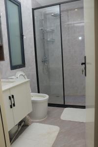 Koupelna v ubytování Alba Garden