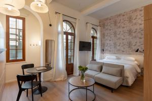 Ένα ή περισσότερα κρεβάτια σε δωμάτιο στο Nest Barrio Paris-Londres