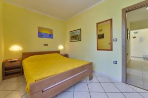 Ένα ή περισσότερα κρεβάτια σε δωμάτιο στο Anka in Medulin * Istrien