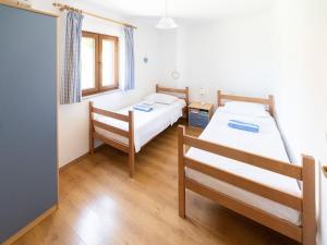 Postel nebo postele na pokoji v ubytování Villa Oliva + 22 fotografií