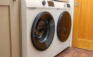 a washer and dryer in a room at Cornflower in Edlington +7 photos