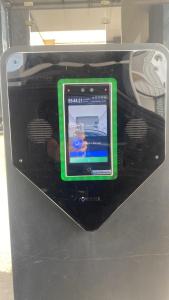 a green tablet sitting on top of a machine at Casa Cop30 Belém in Belém
