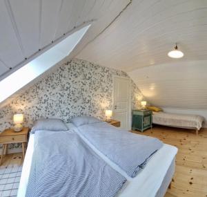 A bed or beds in a room at Cozy house in Jammerbugt near Løkken & Blokhus Még 70 kép