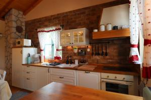 Kuchyň nebo kuchyňský kout v ubytování Casa Bianka