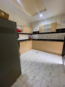 Kuchyň nebo kuchyňský kout v ubytování Aggrandize Luxury Homes