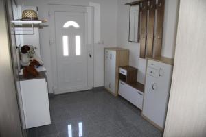 Kuchyňa alebo kuchynka v ubytovaní Apartment Pal