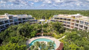 an aerial view of a resort with a swimming pool at Mistiq Temple I in Tulum