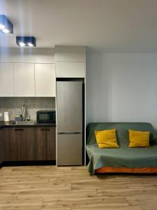Η κουζίνα ή μικρή κουζίνα στο Apartament Targowa +17 φωτογραφίες