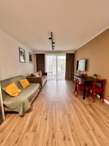 Μια τηλεόραση ή/και κέντρο ψυχαγωγίας στο Apartament Targowa