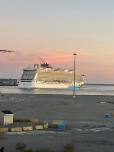 a cruise ship is docked at the beach at Mariners Nest in Saint John