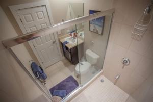 an overhead view of a bathroom with a toilet and sink at Casa Sommer 3br Resort Condo Pacifico L605 in Coco