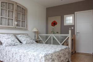 Postel nebo postele na pokoji v ubytování Chambre d'hôtes face à Briare