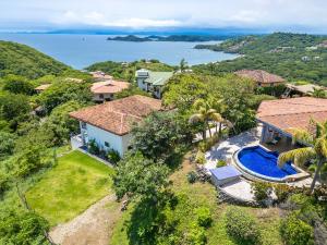 an aerial view of a house with a swimming pool at Vista Oceano in Playa Hermosa