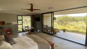 A bed or beds in a room at Savanna Villas Még 42 kép