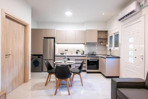 Kuchyň nebo kuchyňský kout v ubytování Corner Apartment