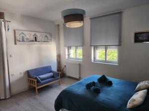 Postel nebo postele na pokoji v ubytování La Caloge