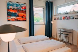 Ένα ή περισσότερα κρεβάτια σε δωμάτιο στο Ferienhaus Lieblingsplatz