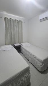 Postel nebo postele na pokoji v ubytování Flat Privê Paraíso dos Carneiros Praia dos Carneiros