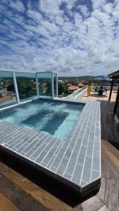 Bazén v ubytování Flat Privê Paraíso dos Carneiros Praia dos Carneiros nebo v jeho okolí + 12 fotografií