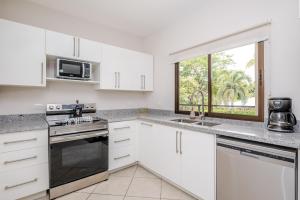 Una cocina o kitchenette en Paradizio 204
