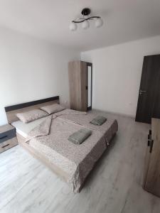 Postel nebo postele na pokoji v ubytování Апартамент Актив Спорт Гранд