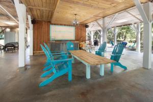 Et tv og/eller underholdning på Sea Island Cotton Cottage