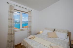 Voodi või voodid majutusasutuse Raos in Trogir - Mittel-Dalmatien toas